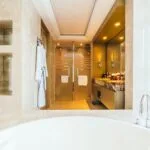 Luxury bathroom remodeling vanity and tile installation - Do I Need Complete Home Remodeling After Major Water Damage?
